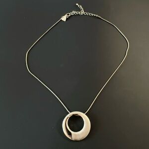Cookie Lee Silver Tone Sculptural Circle Pendant Necklace